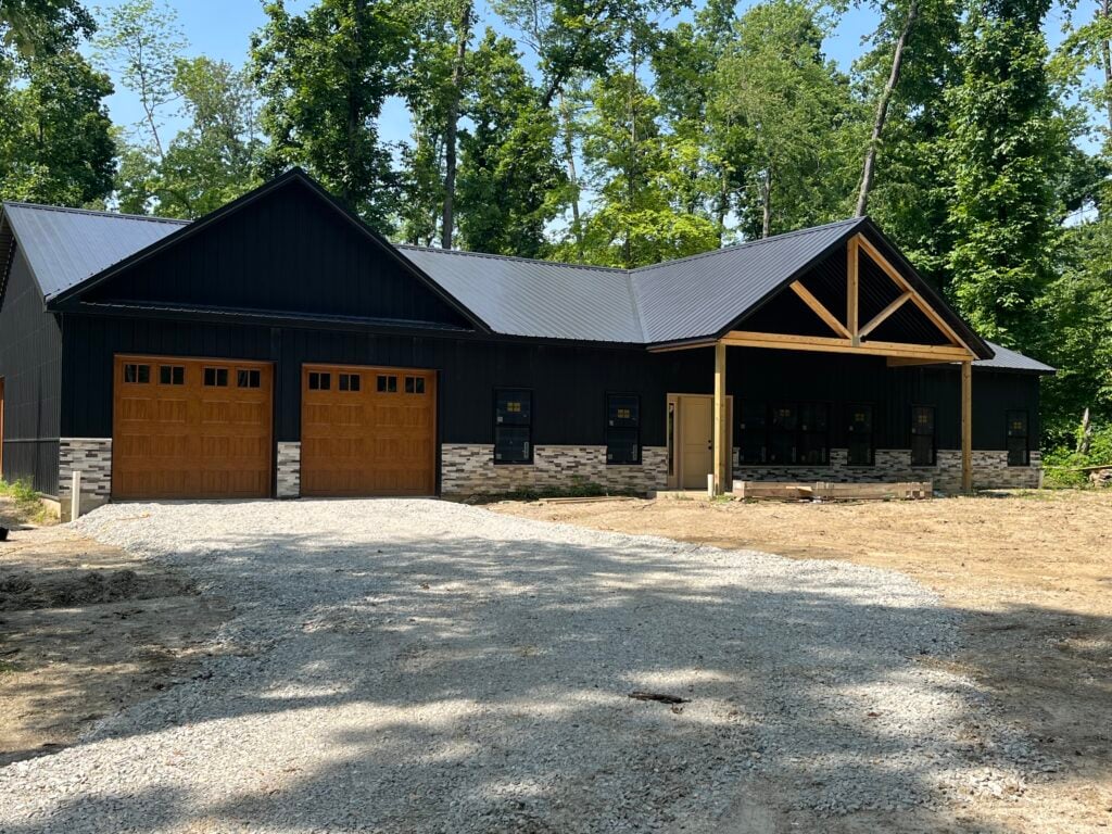 completed PL-71001 Olivia 4 bedroom barndominium exterior photograph