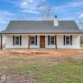 Henry RP-10003 barndominium plan exterior build photo