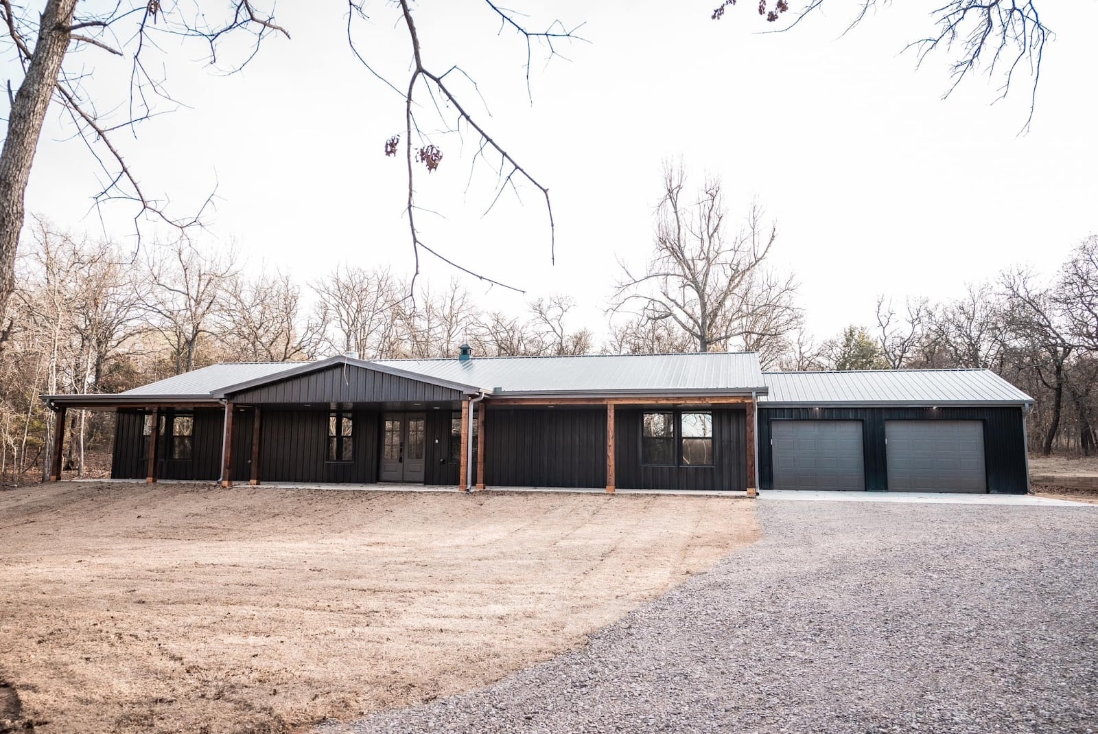 exterior of the completed HC-24003 Magnolia 4 bedroom barndominium in Norman, Oklahoma