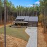 Linda HPZ-22019 barndominium completed build photo driveway